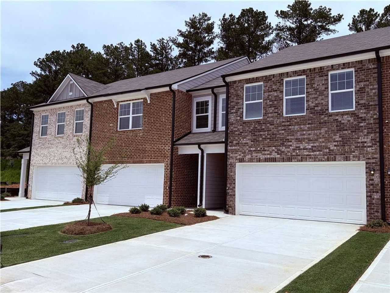 Front exterior of a new home in Kendall Grove, McDonough, GA, highlighting curb appeal (Image 2).
