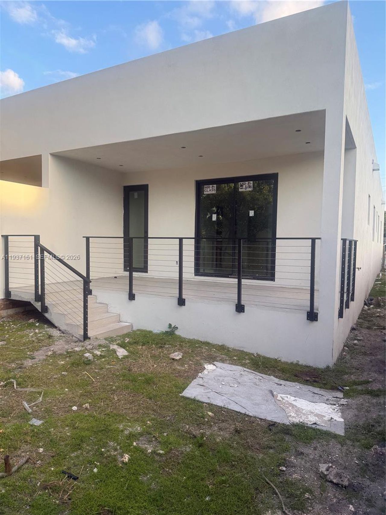 Exterior details and patio area of a home in , Miami (Image 2).