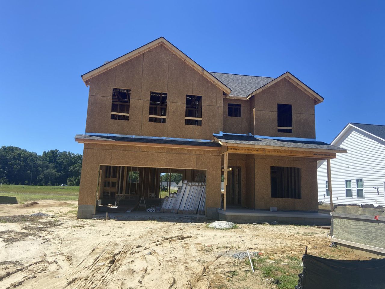 Front exterior of a new home in Arbor Hills South II, Greenville, NC, highlighting curb appeal (Image 2).