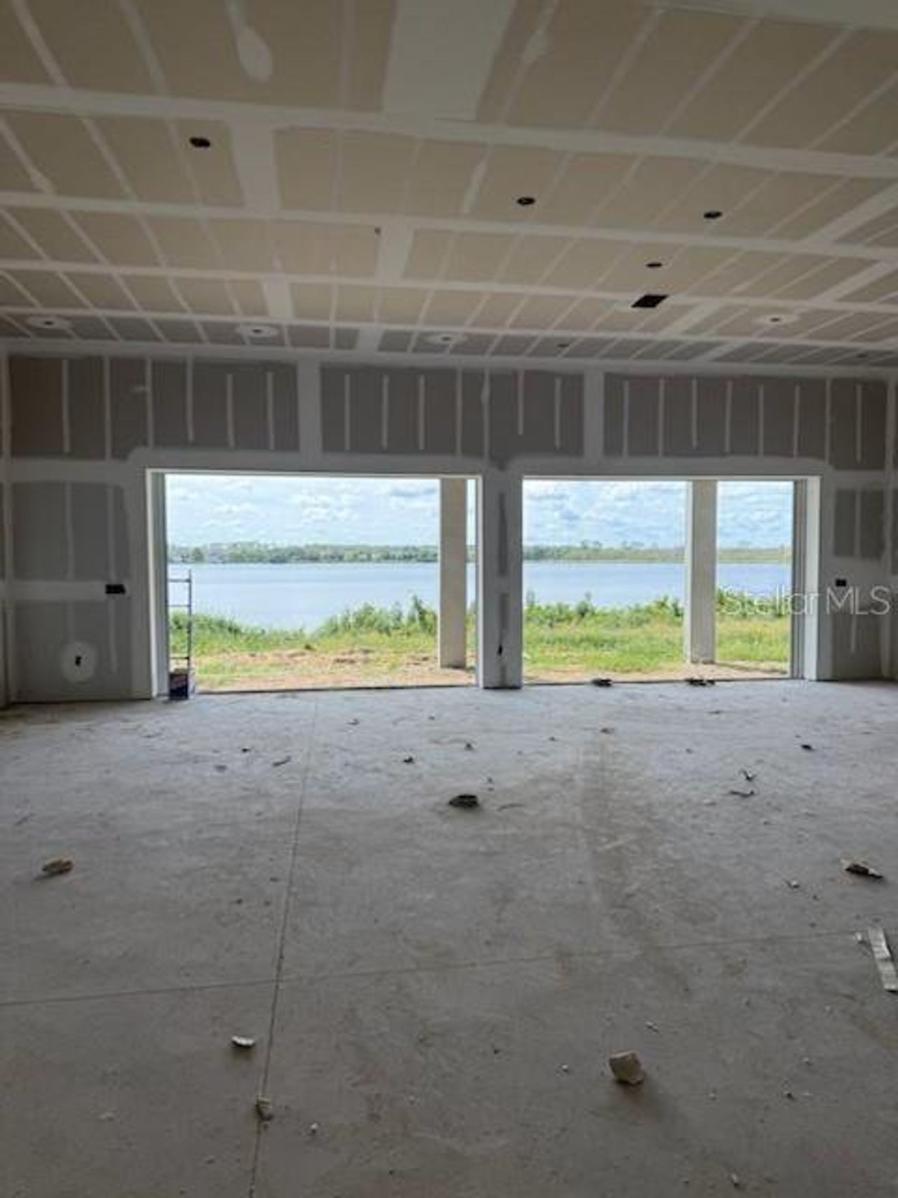 In-progress construction of a new home in Shorefront Cove, Winter Garden, FL (Image 2).
