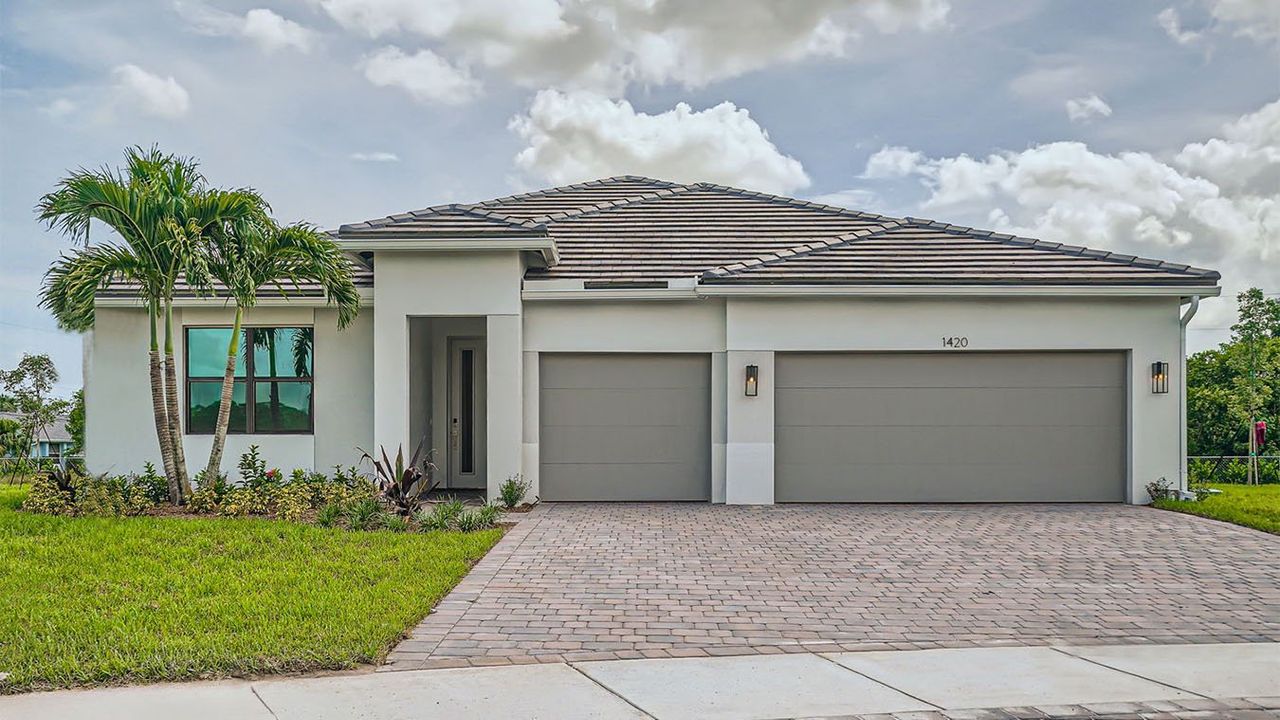 Representative exterior photo of a completed home built from the Fraser by D.R. Horton in Estrella Square, Homestead, FL (Image 2).