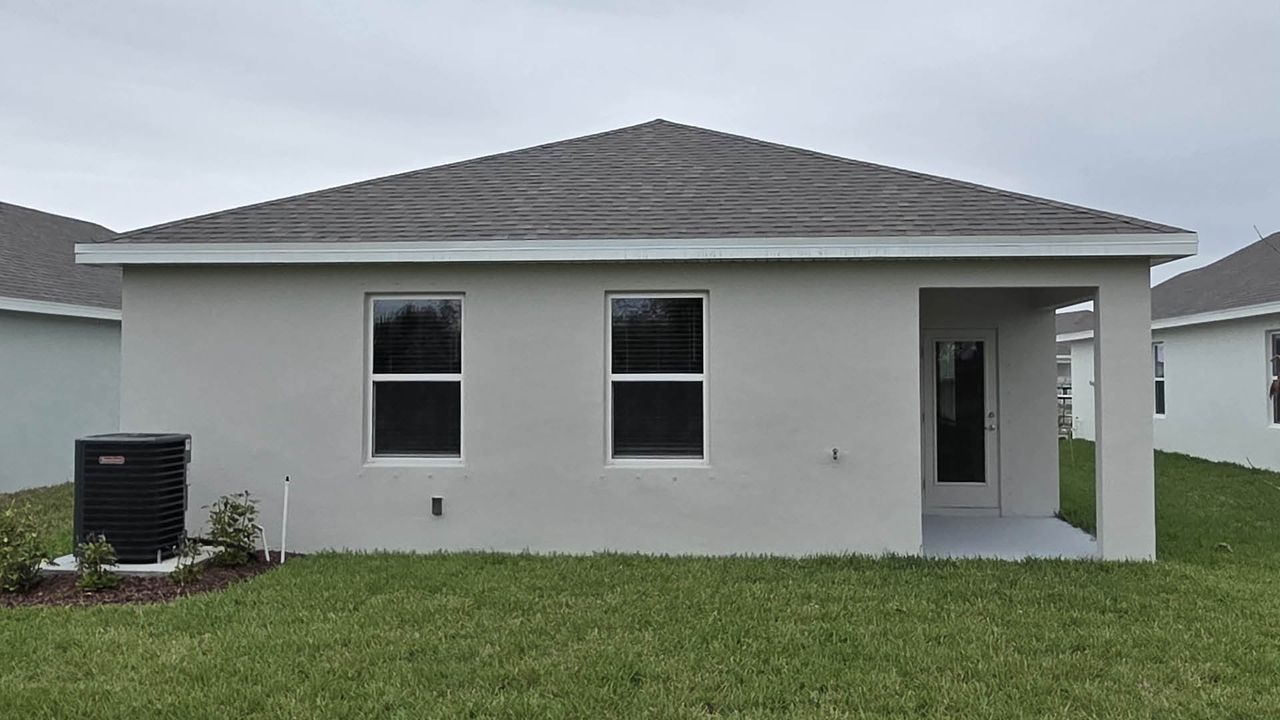 Exterior details and patio area of a home in Venetian Grove, Vero Beach (Image 2). Exterior details and patio area of a home in Venetian Grove, Vero Beach (Image 2).