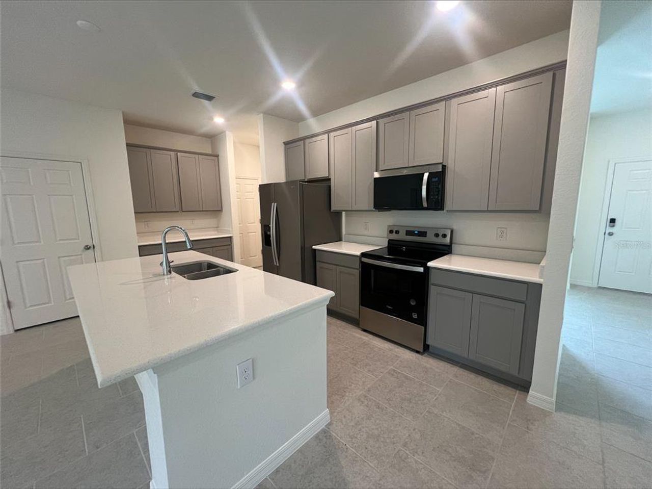 Furnished interior view inside a new home in Port Charlotte, Port Charlotte (Image 2).