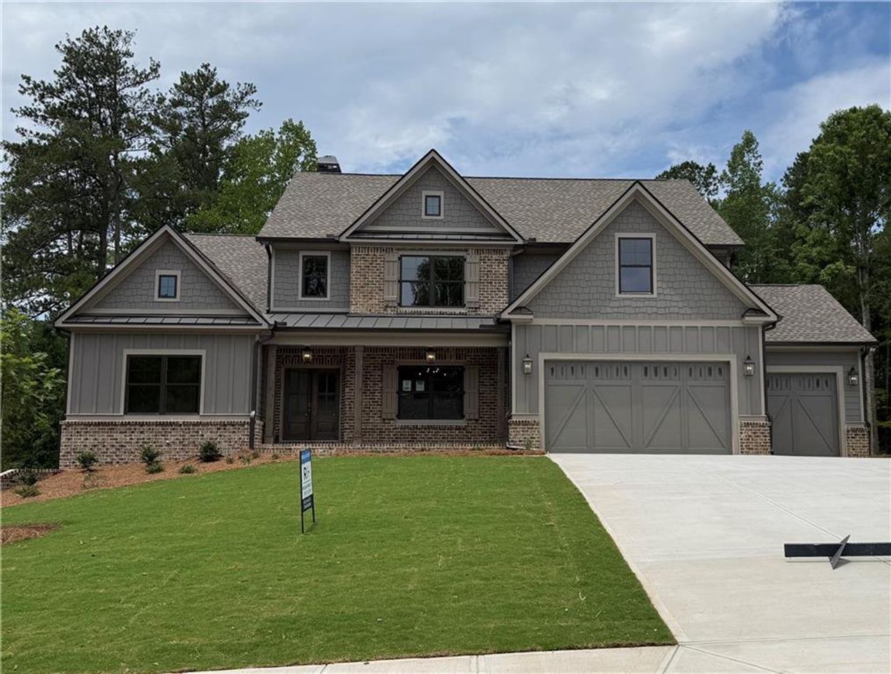 Front exterior of a new home in Spring Creek, Monroe, GA, highlighting curb appeal (Image 2). Front exterior of a new home in Spring Creek, Monroe, GA, highlighting curb appeal (Image 2).