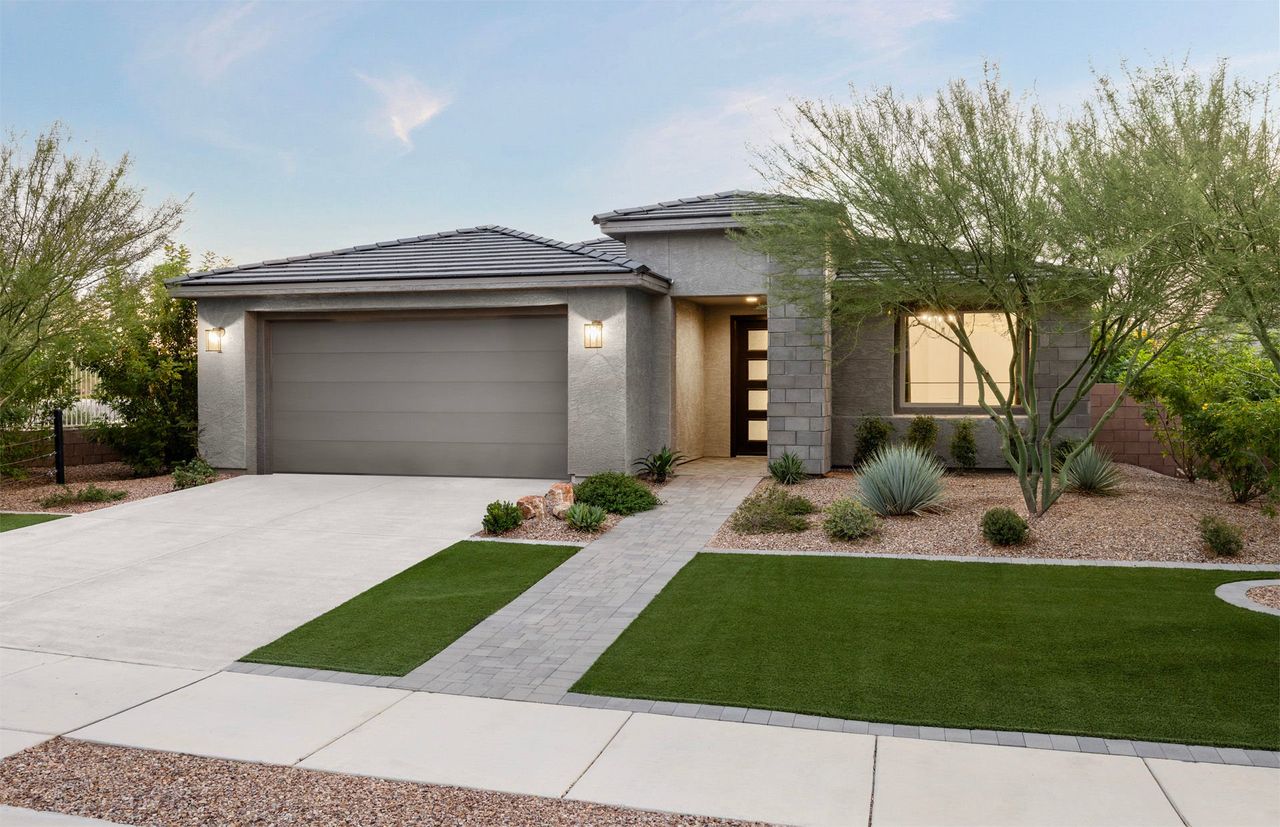 Front exterior of a new home in Del Webb at Rocking K, Tucson, AZ, highlighting curb appeal (Image 2). Front exterior of a new home in Del Webb at Rocking K, Tucson, AZ, highlighting curb appeal (Image 2).