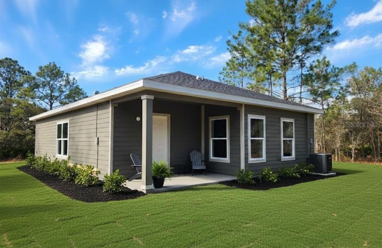 Exterior details and patio area of a home in , Brooksville (Image 2).