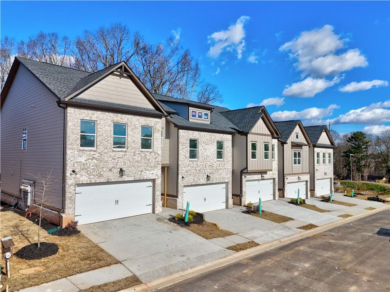 Front exterior of a new home in , Norcross, GA, highlighting curb appeal (Image 2).