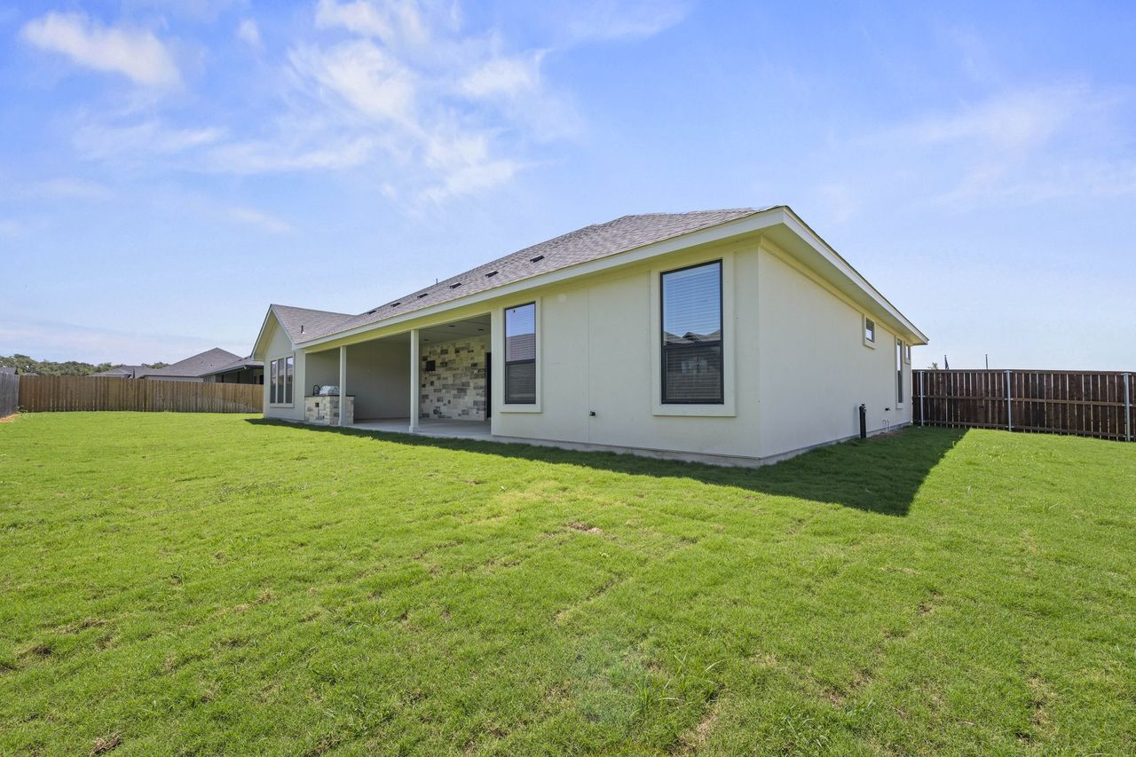 Exterior details and patio area of a home in Bella Charca, Nolanville (Image 2).