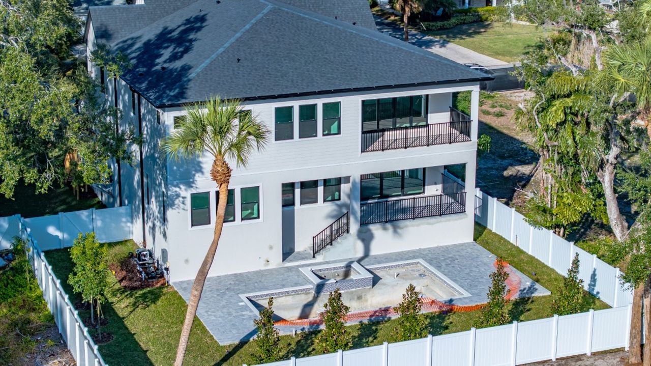 Exterior details and patio area of a home in City Homes - South Tampa, Tampa (Image 2).
