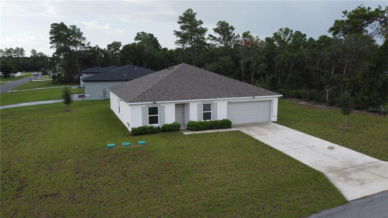 Front exterior of a new home in Ocala, Ocala, FL, highlighting curb appeal (Image 2).