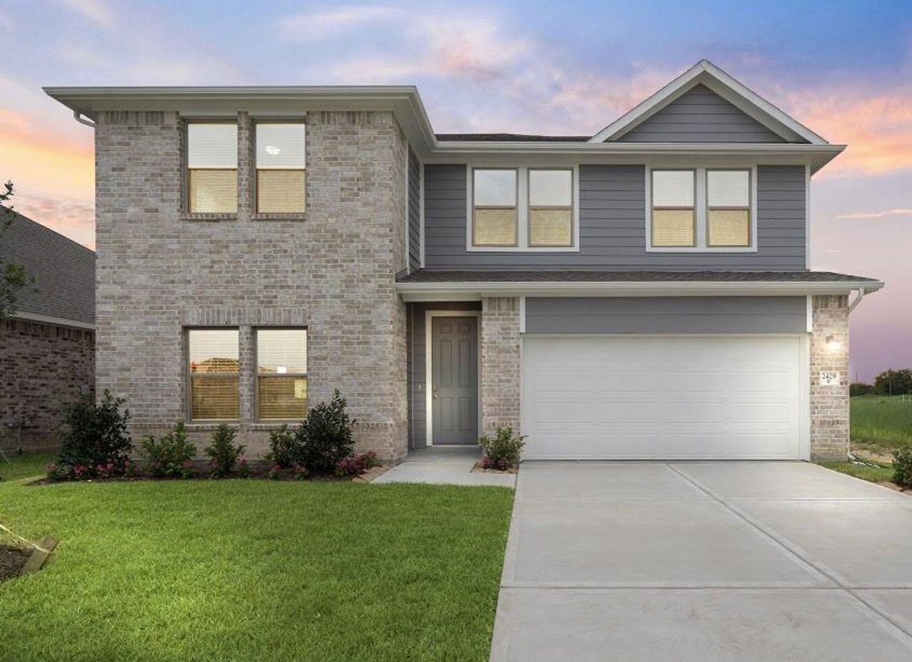 Front exterior of a new home in River Ranch Trails, Dayton, TX, highlighting curb appeal (Image 2). Front exterior of a new home in River Ranch Trails, Dayton, TX, highlighting curb appeal (Image 2).