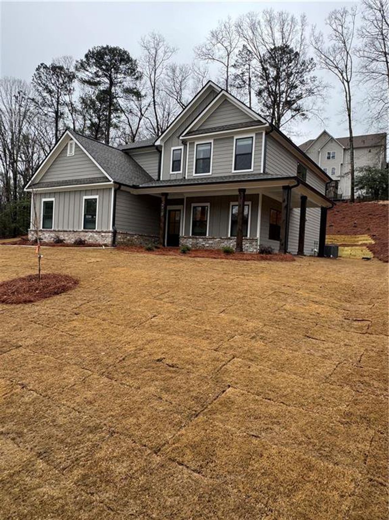 Exterior details and patio area of a home in Red Oak Ridge, Loganville (Image 2).