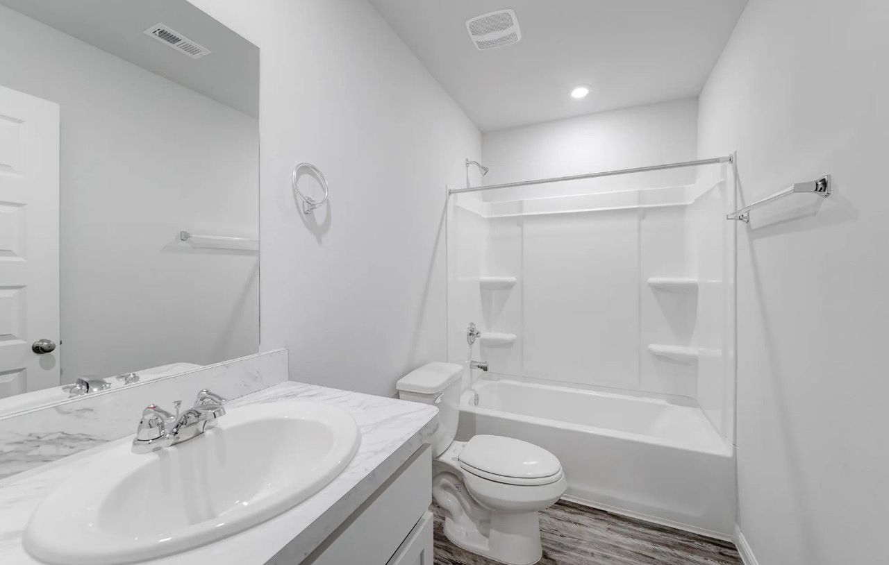 Representative exterior photo of a completed home built from the Olympic by National HomeCorp in Las Colinas, Kenedy, TX (Image 2).