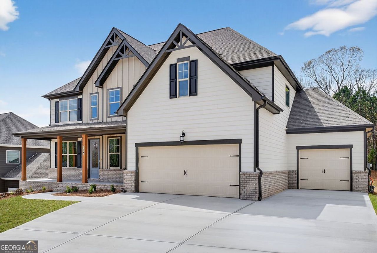 Front exterior of a new home in The Manor at Gainesville Township, Gainesville, GA, highlighting curb appeal (Image 2).