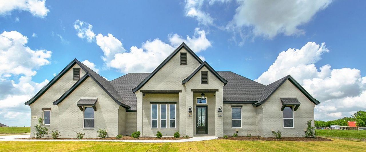 Representative exterior photo of a completed home built from the 151-2557-1018 by Abba River Homes in Stanford Estates, Springtown, TX (Image 2). Representative exterior photo of a completed home built from the 151-2557-1018 by Abba River Homes in Stanford Estates, Springtown, TX (Image 2).