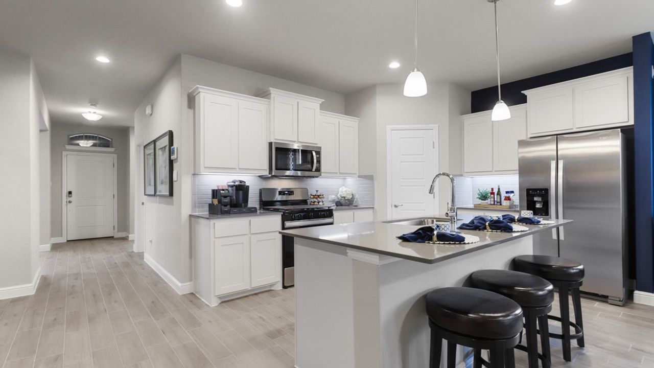 Furnished interior view inside a new home in Bluestem, Rhome (Image 2).