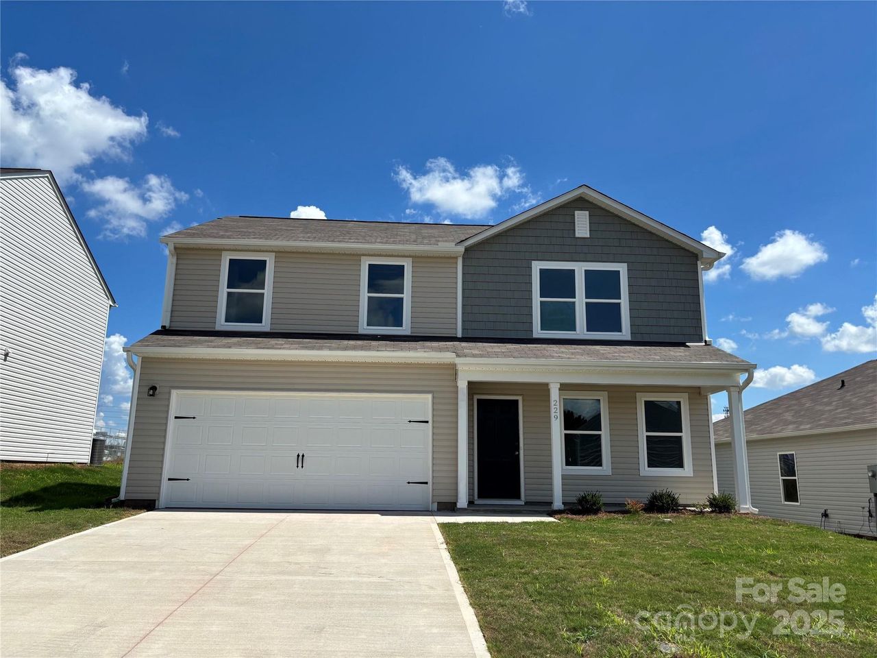 Front exterior of a new home in Buffalo Creek, Union, SC, highlighting curb appeal (Image 2). Front exterior of a new home in Buffalo Creek, Union, SC, highlighting curb appeal (Image 2).