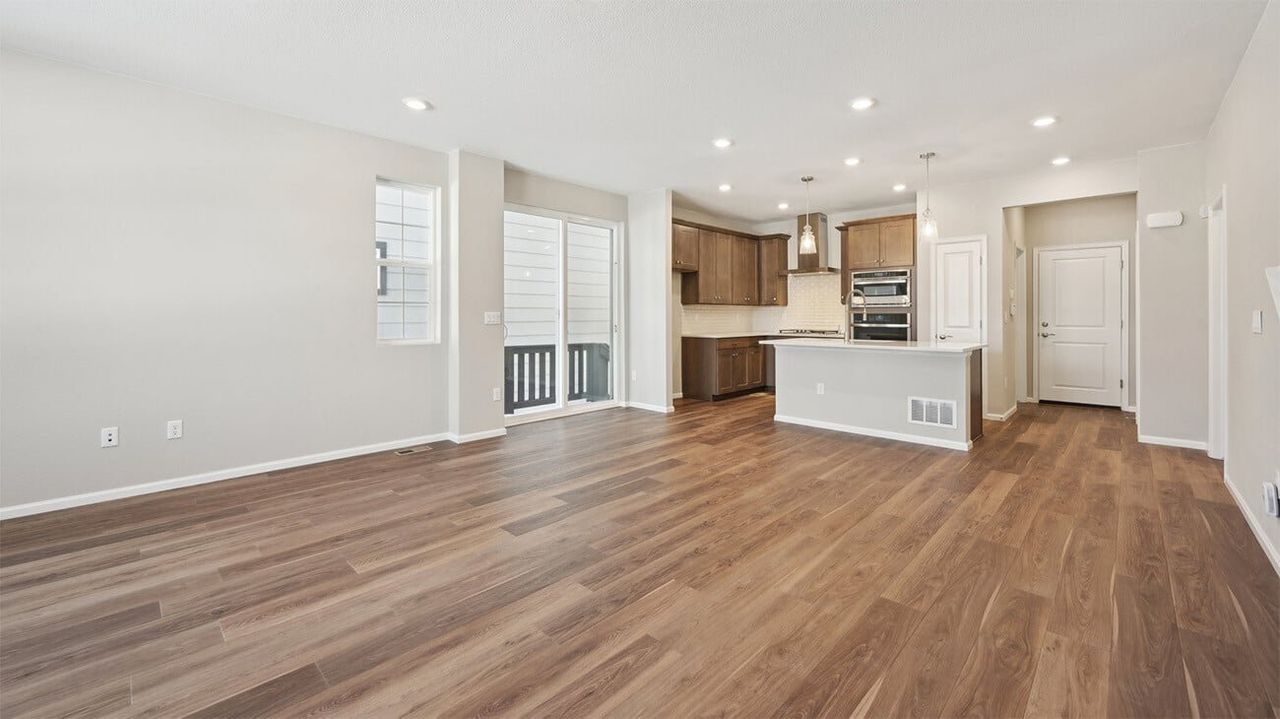 Spacious, unfurnished interior of a new home in The Villas Collection at Sterling Ranch, Littleton (Image 2).