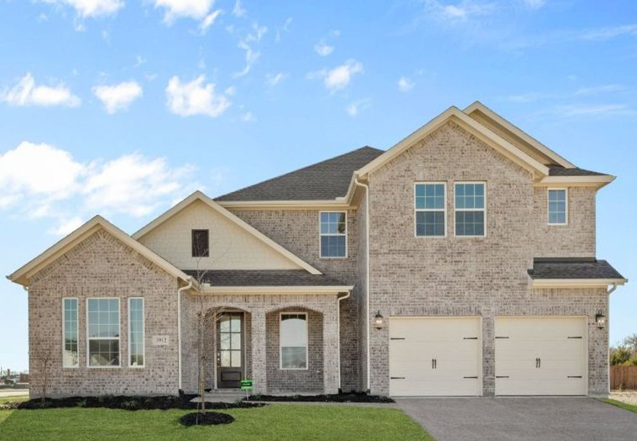Representative exterior photo of a completed home built from the Whitney by UnionMain Homes in Myrtle Creek, Waxahachie, TX (Image 2).