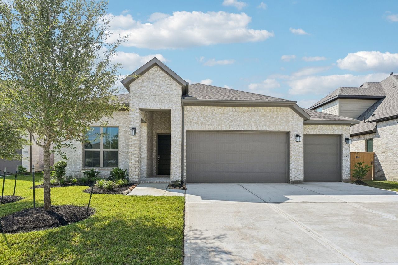 Representative exterior photo of a completed home built from the Avery by Risewell Homes in Raburn Reserve, Tomball, TX (Image 2). Representative exterior photo of a completed home built from the Avery by Risewell Homes in Raburn Reserve, Tomball, TX (Image 2).