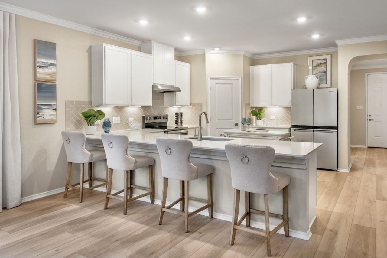 Representative furnished interior of a home built from the 2088 by KB Home in River Bluff, Leander (Image 2).