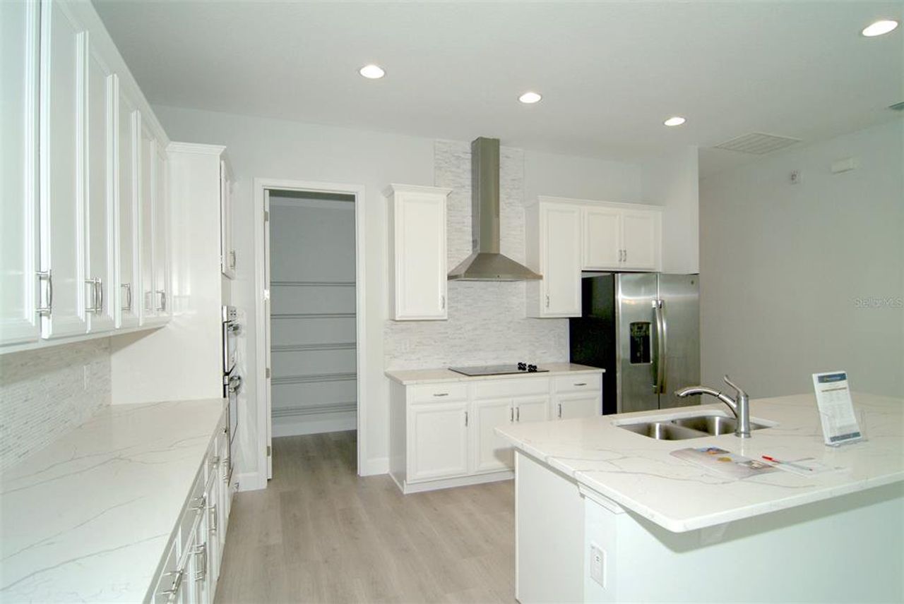 Furnished interior view inside a new home in Laureate Park at Lake Nona, Orlando (Image 2). Furnished interior view inside a new home in Laureate Park at Lake Nona, Orlando (Image 2).