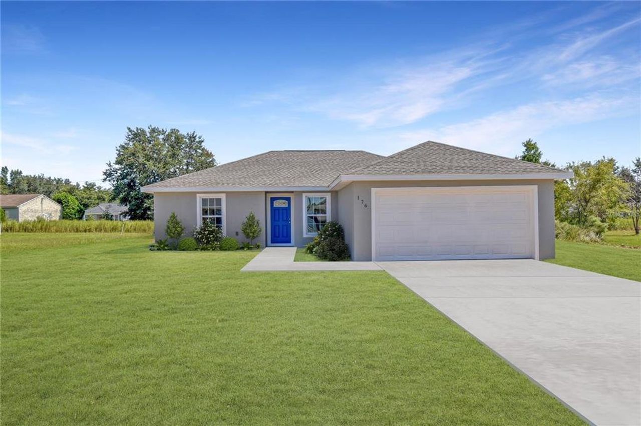 Front exterior of a new home in , Dunnellon, FL, highlighting curb appeal (Image 2). Front exterior of a new home in , Dunnellon, FL, highlighting curb appeal (Image 2).