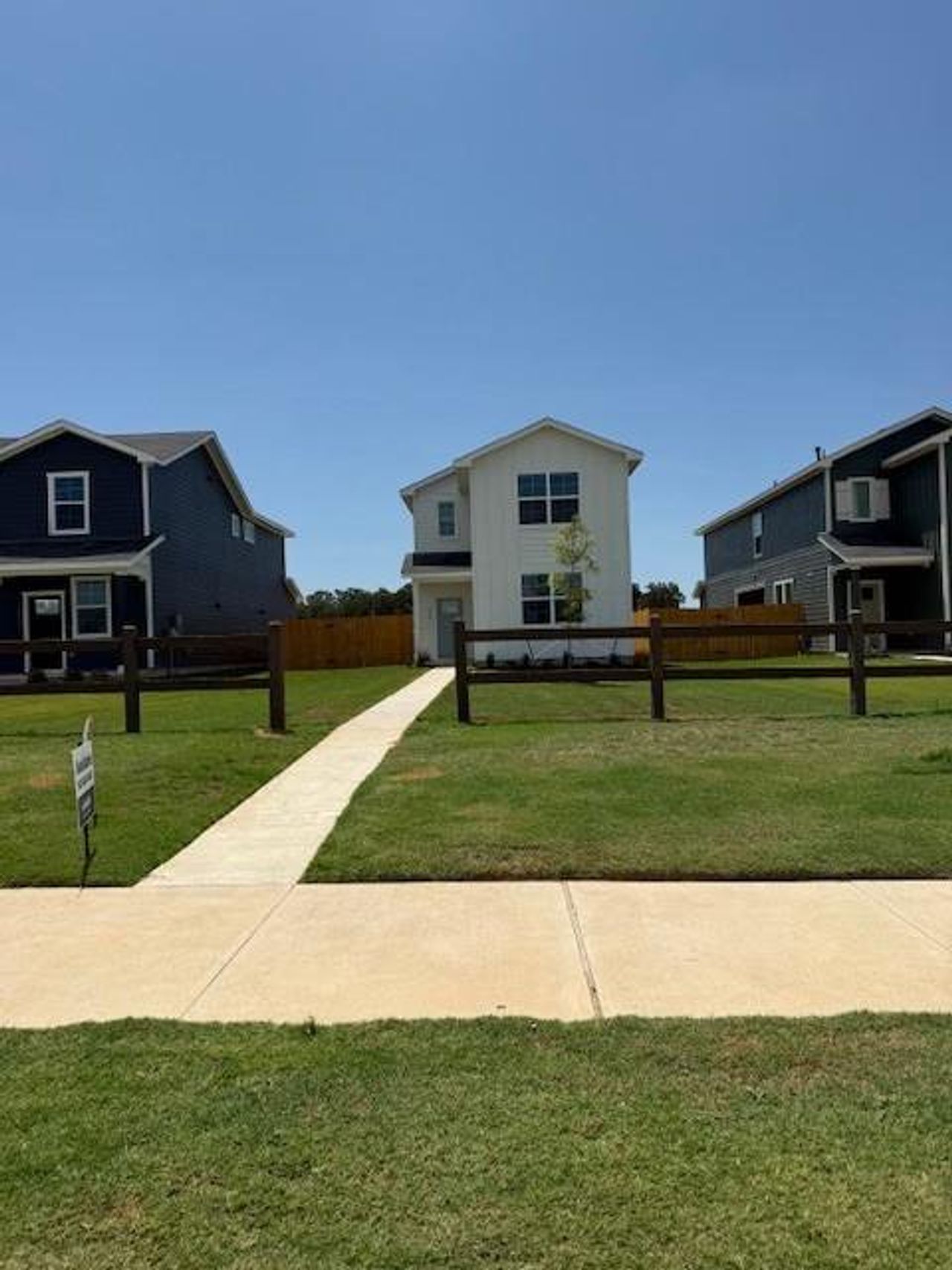 Front exterior of a new home in Valverde, Bastrop, TX, highlighting curb appeal (Image 2).