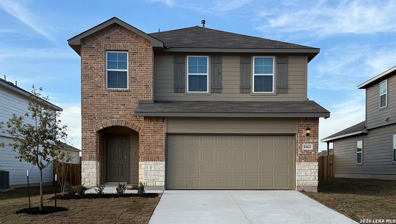 Front exterior of a new home in Riverstone at Westpointe, San Antonio, TX, highlighting curb appeal (Image 2). Front exterior of a new home in Riverstone at Westpointe, San Antonio, TX, highlighting curb appeal (Image 2).