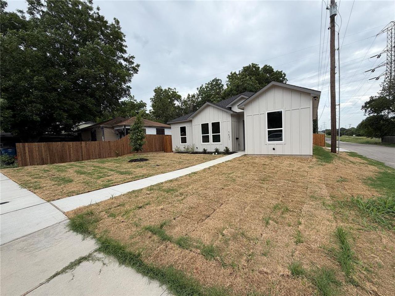Front exterior of a new home in , Dallas, TX, highlighting curb appeal (Image 2).