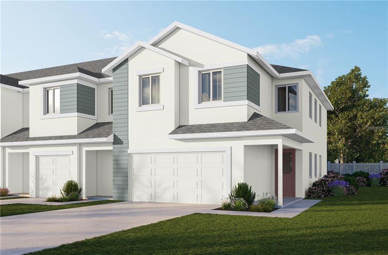 Front exterior of a new home in River Oaks Townhomes, Riverview, FL, highlighting curb appeal (Image 2). Front exterior of a new home in River Oaks Townhomes, Riverview, FL, highlighting curb appeal (Image 2).