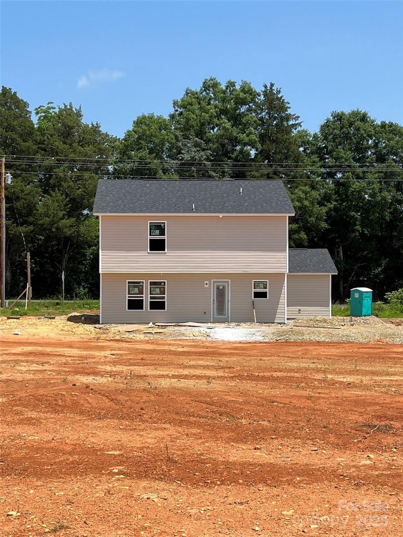 Front exterior of a new home in , Denton, NC, highlighting curb appeal (Image 2).