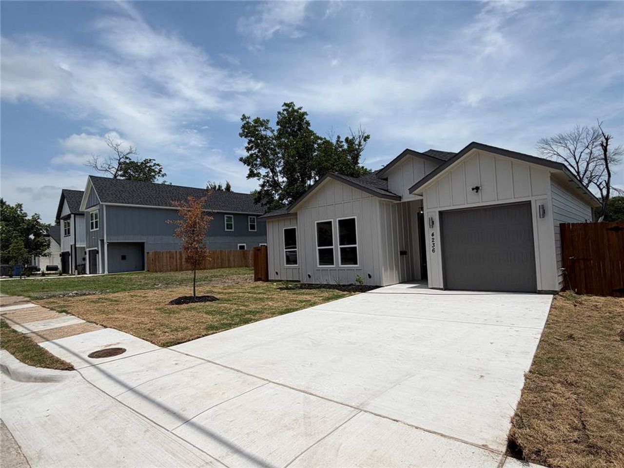 Front exterior of a new home in , Dallas, TX, highlighting curb appeal (Image 2).