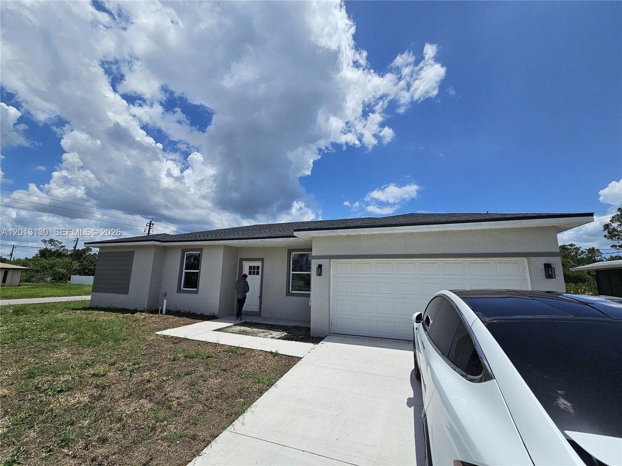 Exterior details and patio area of a home in , Port Charlotte (Image 2).