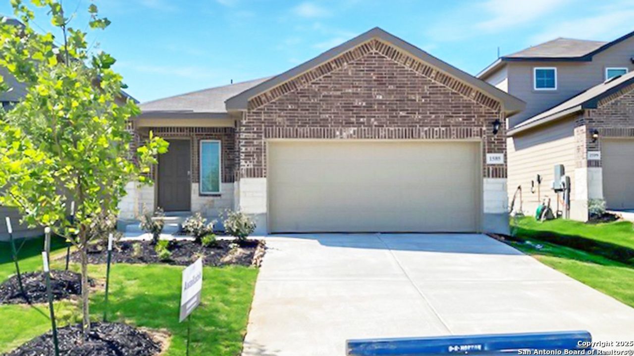 Front exterior of a new home in Winding Creek, New Braunfels, TX, highlighting curb appeal (Image 2).