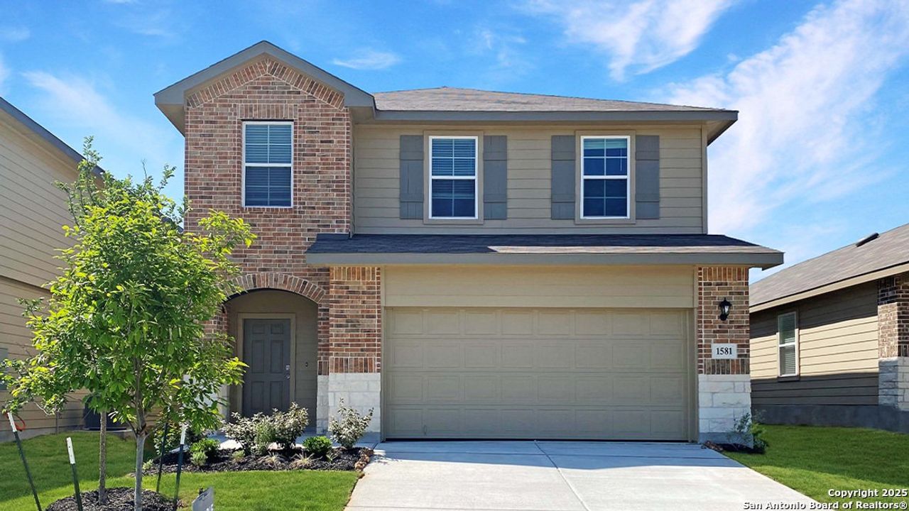 Front exterior of a new home in Winding Creek, New Braunfels, TX, highlighting curb appeal (Image 2). Front exterior of a new home in Winding Creek, New Braunfels, TX, highlighting curb appeal (Image 2).