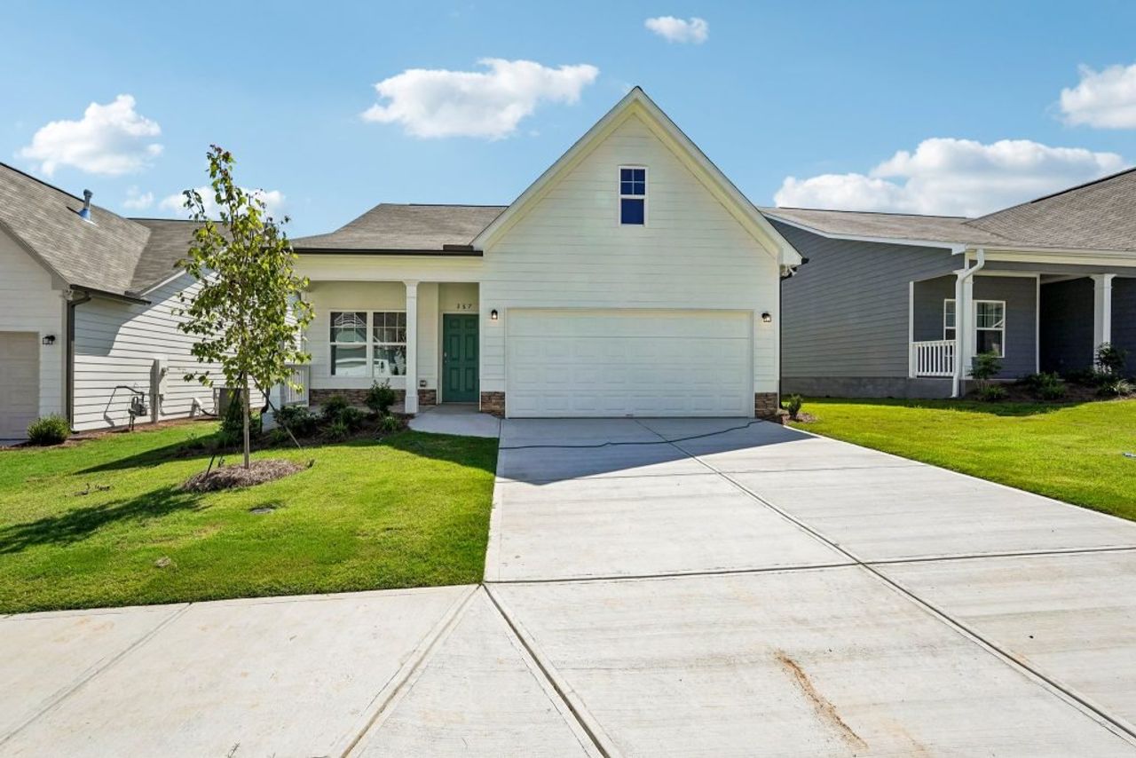 Front exterior of a new home in Villages at Cedar Hill, Dallas, GA, highlighting curb appeal (Image 2).
