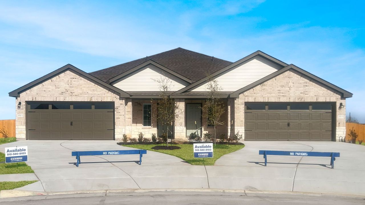 Front exterior of a new home in Palomino, Manor, TX, highlighting curb appeal (Image 2).