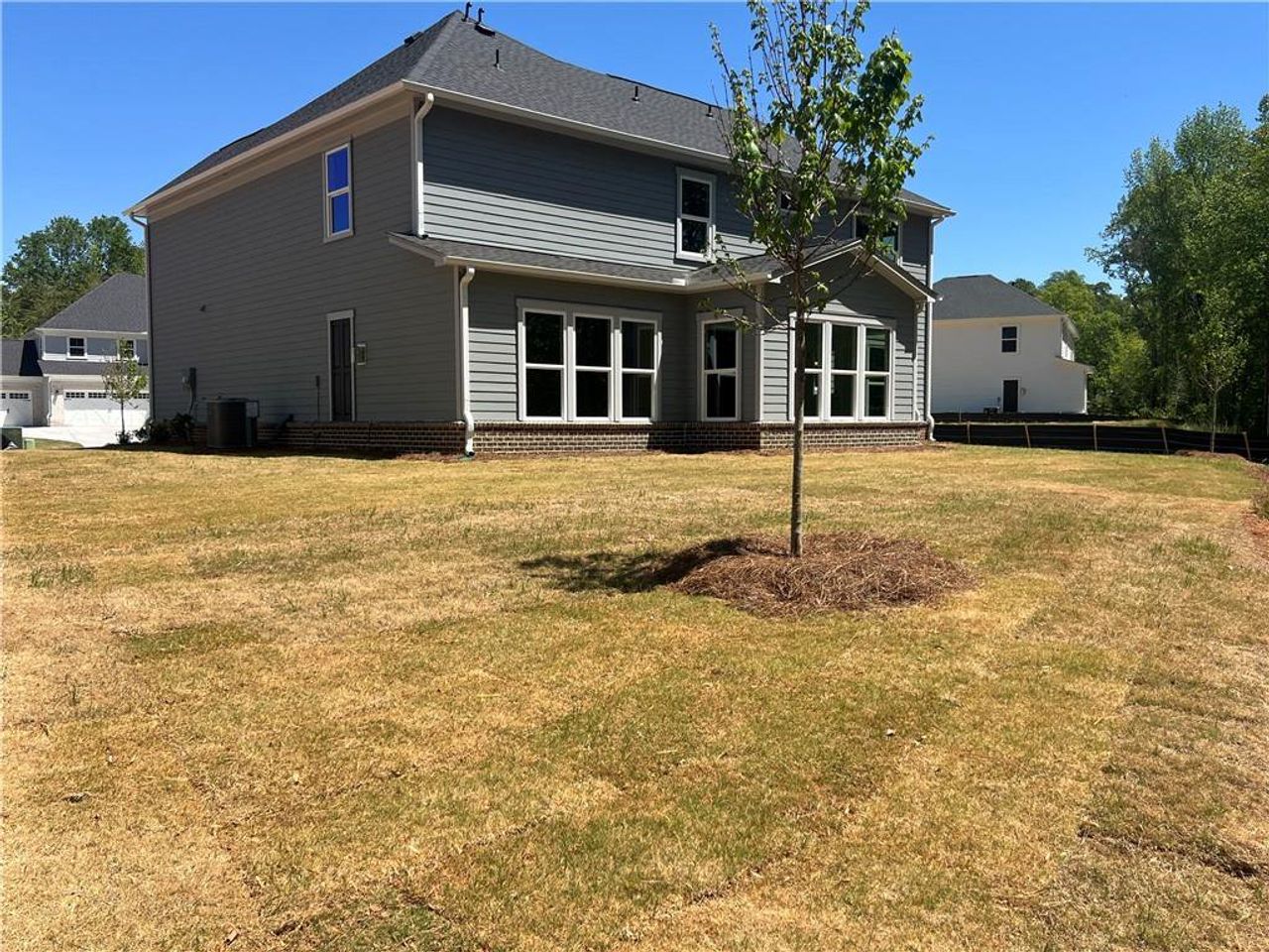 Exterior details and patio area of a home in Rose Creek, Cumming (Image 2).