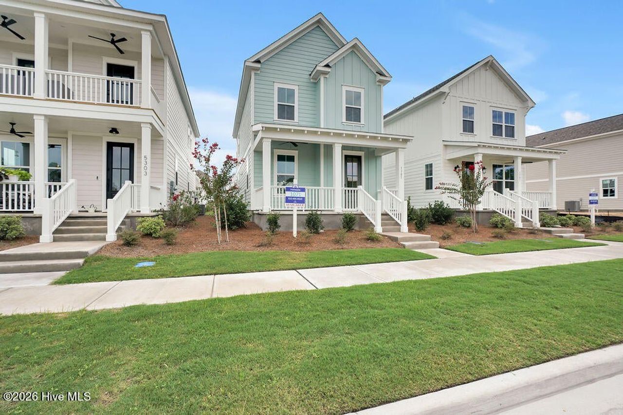 Front exterior of a new home in Riverlights, Wilmington, NC, highlighting curb appeal (Image 2).