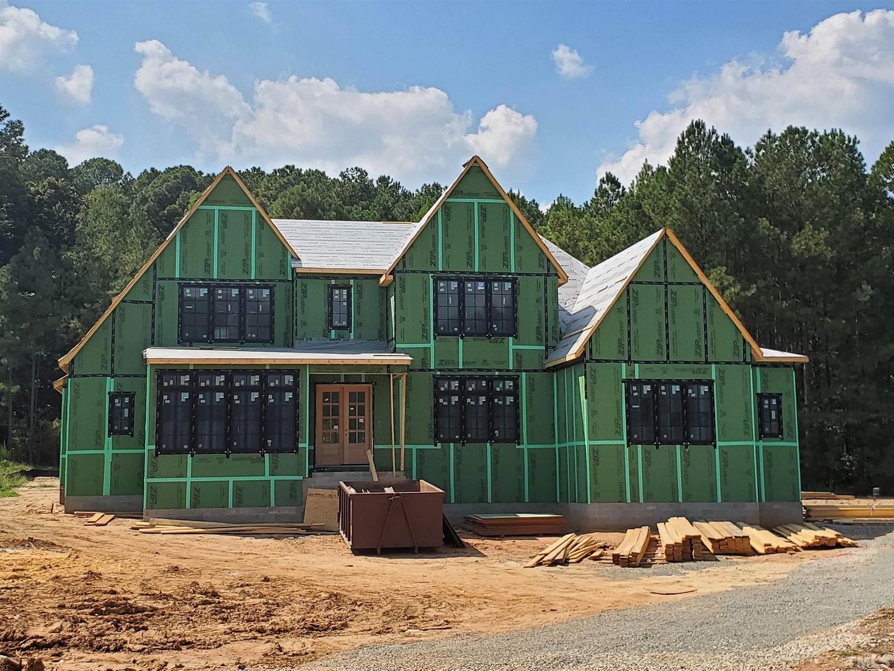 Front exterior of a home in the Avalaire community, located in Raleigh, NC (Image 2).