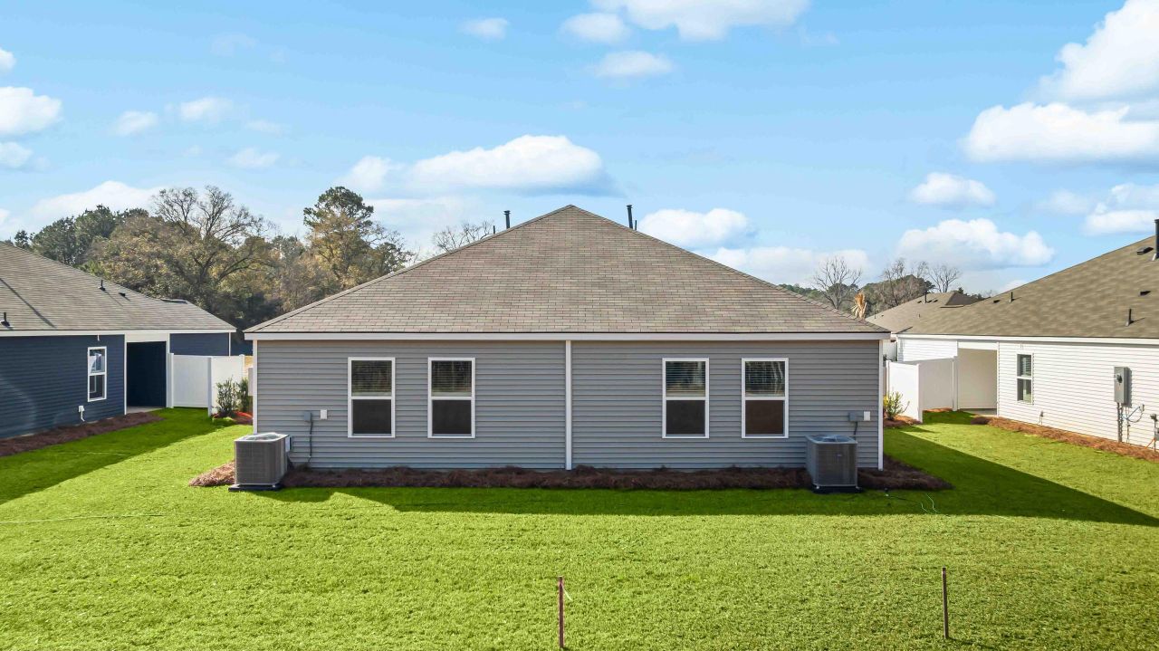 Exterior details and patio area of a home in The Timbers, Harleyville (Image 2).