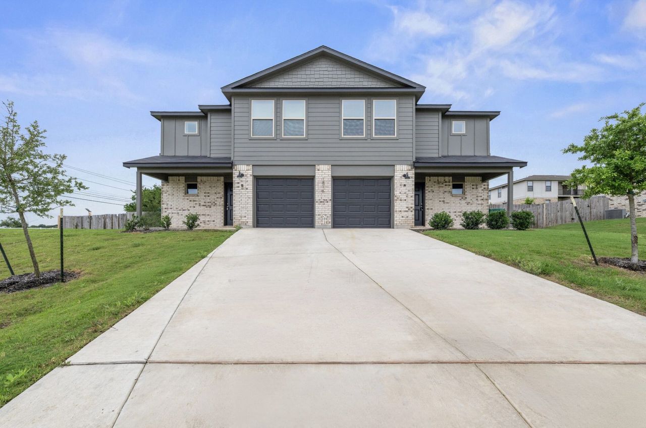 Front exterior of a new home in Tejas Pointe, Harker Heights, TX, highlighting curb appeal (Image 2).