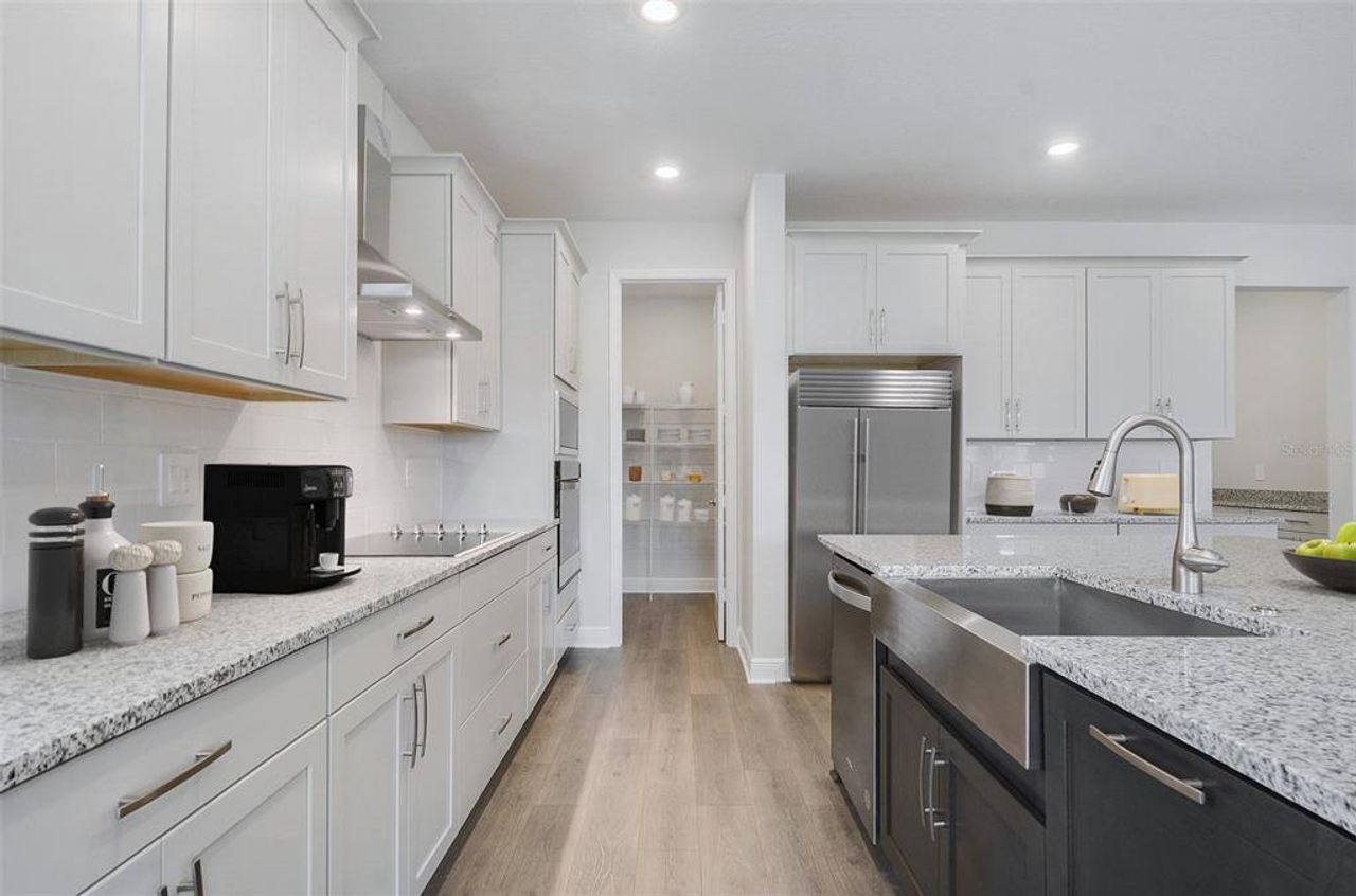 Furnished interior view inside a new home in Acuera Estates, Apopka (Image 2).