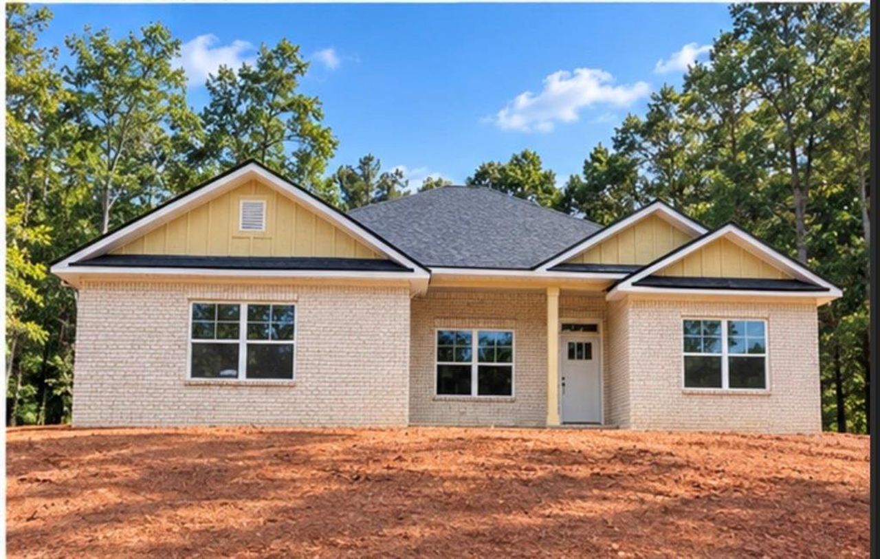 Exterior details and patio area of a home in The Fields of Walnut Creek, Pendergrass (Image 2).