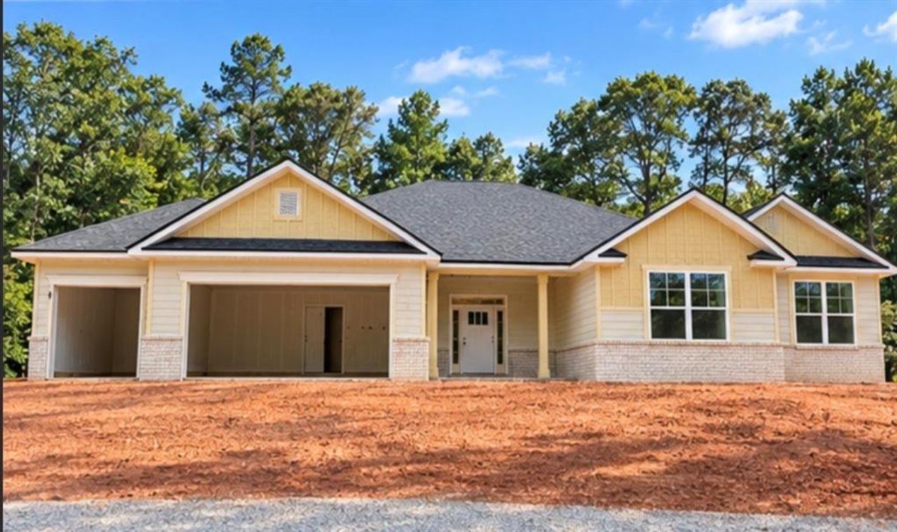 Front exterior of a new home in The Fields of Walnut Creek, Pendergrass, GA, highlighting curb appeal (Image 2).