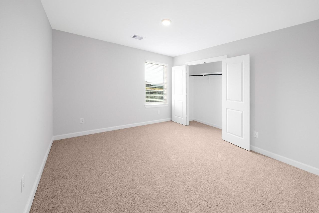 Spacious, unfurnished interior of a new home in Sunterra, Katy (Image 2). Spacious, unfurnished interior of a new home in Sunterra, Katy (Image 2).
