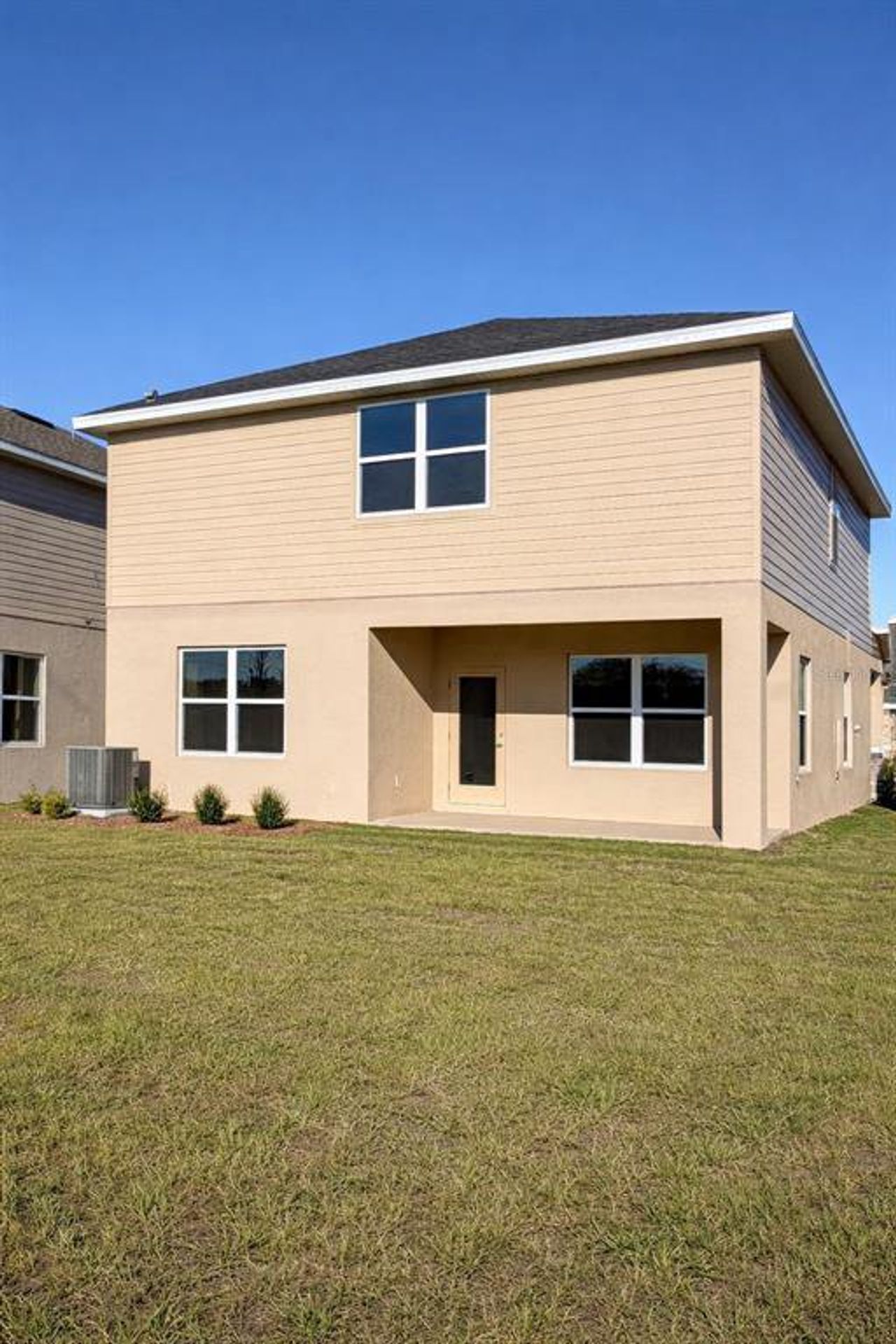 Exterior details and patio area of a home in , Harmony (Image 2). Exterior details and patio area of a home in , Harmony (Image 2).