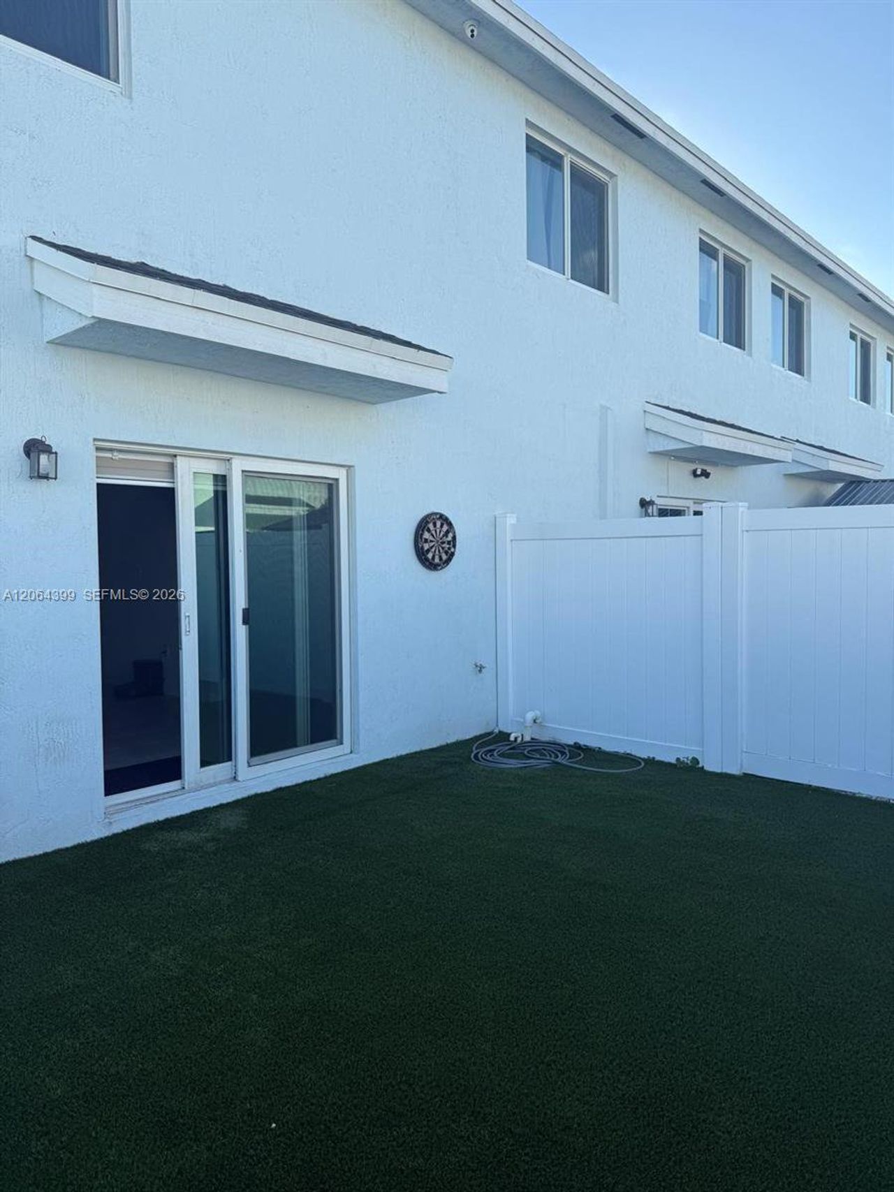 Exterior details and patio area of a home in , Florida City (Image 2).