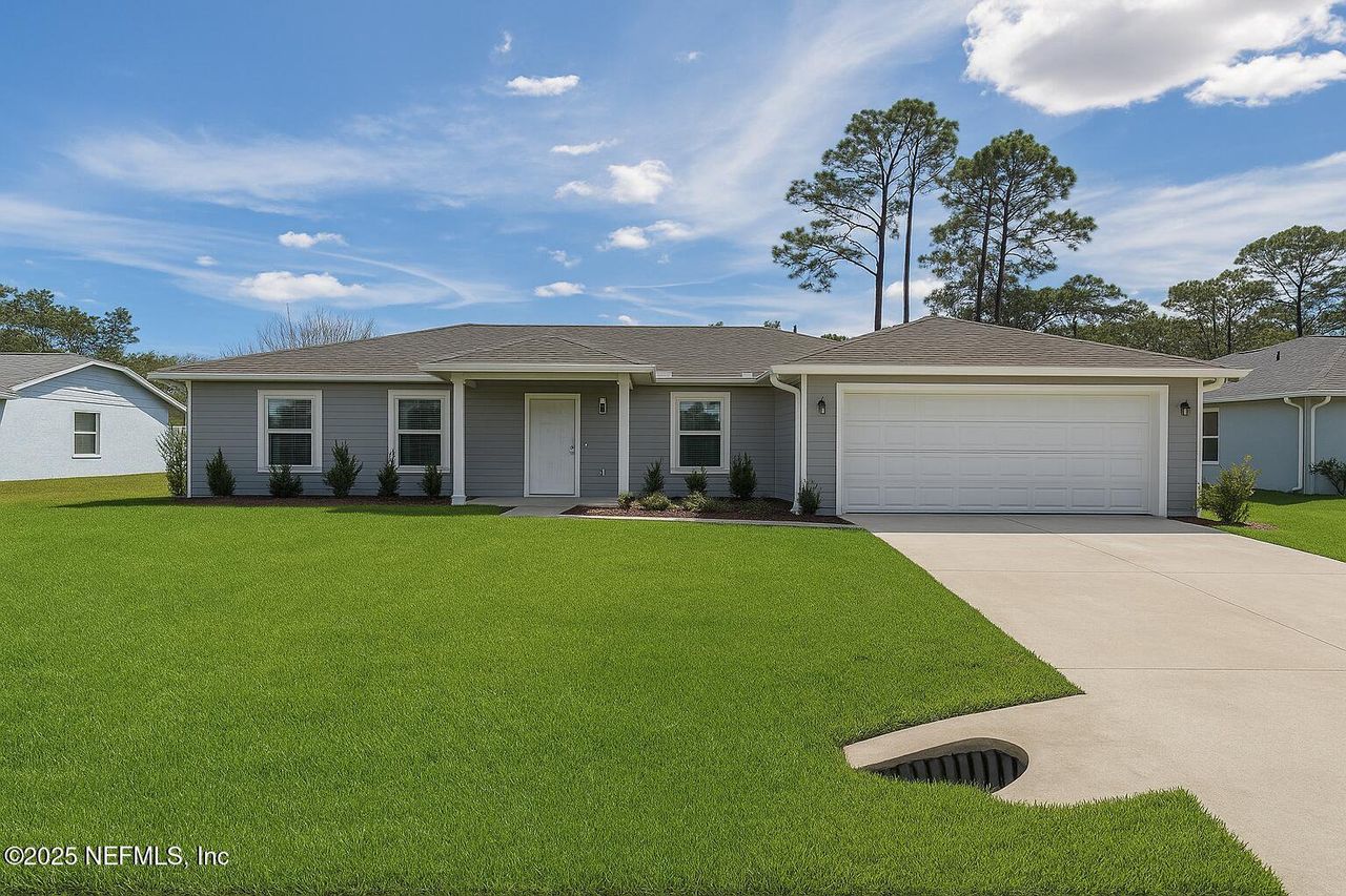 Front exterior of a new home in , Palm Coast, FL, highlighting curb appeal (Image 2).